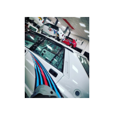 Italiamotorsport Parussini, Codroipo (UD) - Italia - 30 Gennaio 2023 - La #003 in allestimento in primo piano, sullo sfondo manutenzione alla rossa #001 e alla bianca #001