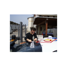 Stivi al lavoro sulla vettura di Marco Gramenzi - Predappio/Rocca delle Caminate 2004